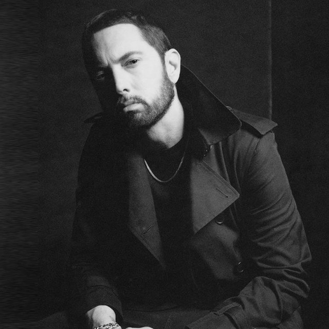 Eminem, rapper with short blonde hair